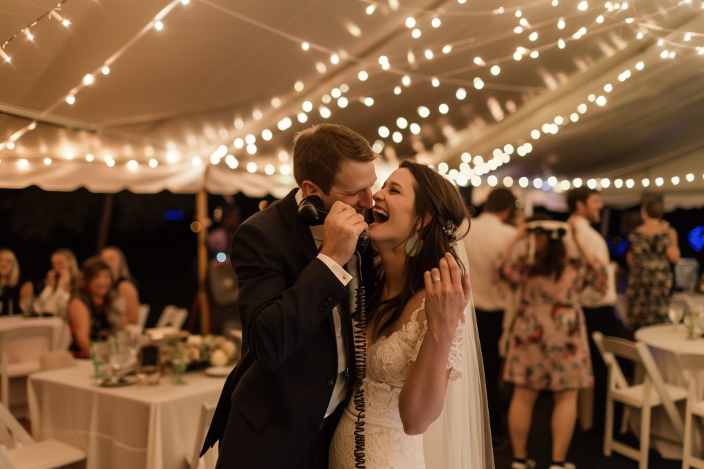 bride and groom using audio guest book